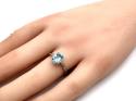 9ct White Gold Blue Topaz & Diamond Halo Ring